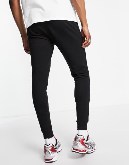 ASOS DESIGN Leichte Jogginghose in Schwarz mit engem Schnitt ASOS