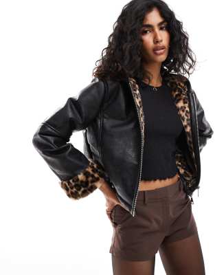 leopard print bonded hooded faux fur jacket in black