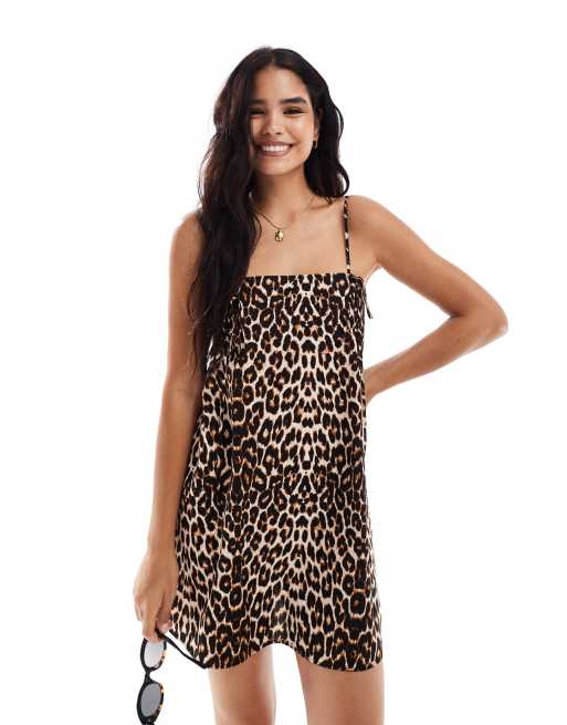 ASOS DESIGN – Leopardmönstrad, a-linjeformad miniklänning med smala axelband och rosett