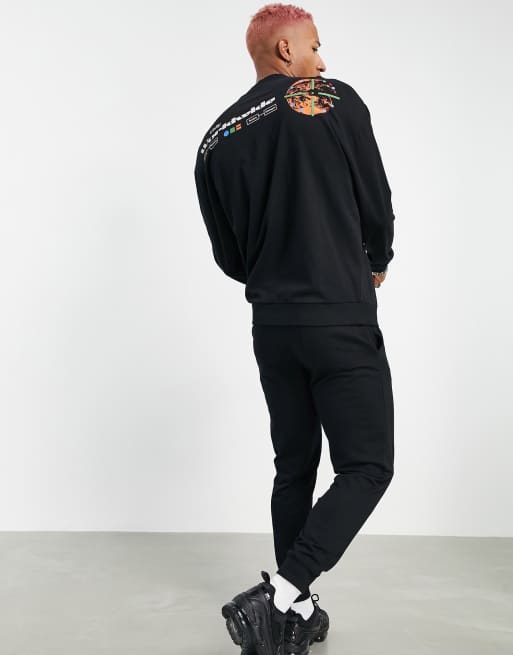 ASOS DESIGN - Let træningssæt med forskellige teknikprint i sort, 2 af 4