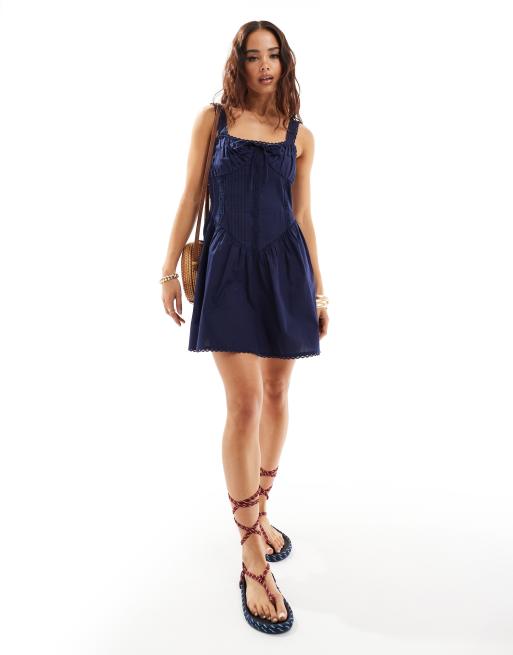 ASOS DESIGN – Letnia granatowoniebieska sukienka mini z gorsetowym dekoltem i koronkowym wykończeniem