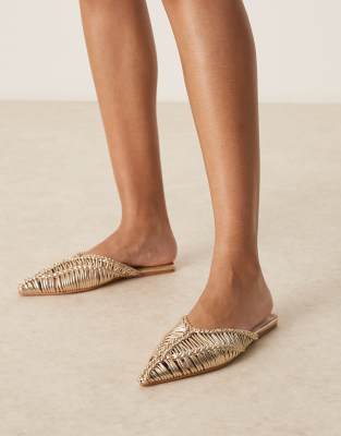 Levant pointed flat mules in woven gold