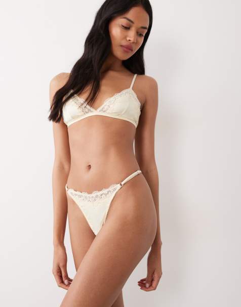 ASOS DESIGN Lexie satin tanga thong with lace trim in buttermilk - view 1