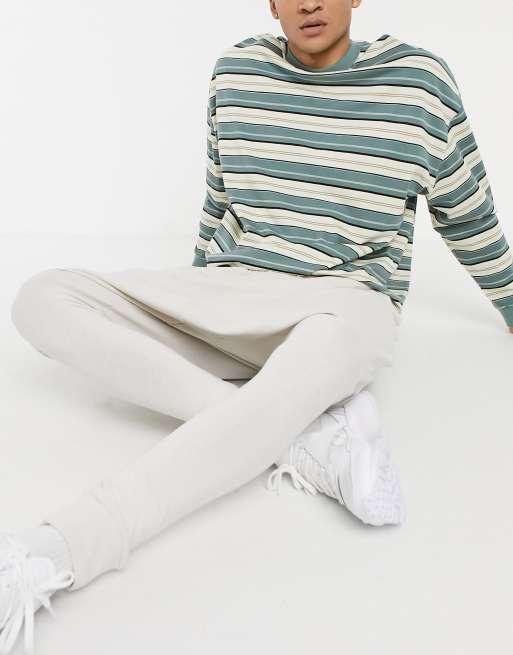 ASOS DESIGN - Lichtgewicht joggingbroek met extreem laag kruis in lichtgrijs