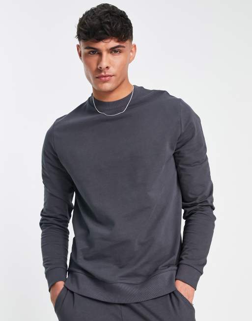 ASOS DESIGN - Lichtgewicht trainingspak met sweatshirt en skinny joggingbroek in zwart met wassing
