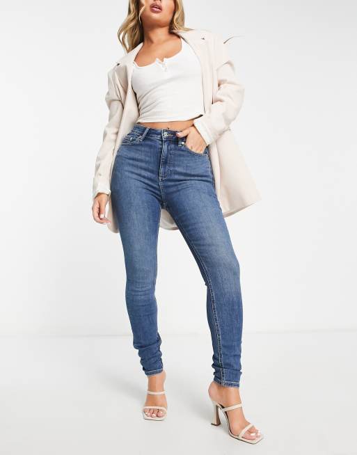 ASOS DESIGN power stretch flared jeans in dark blue