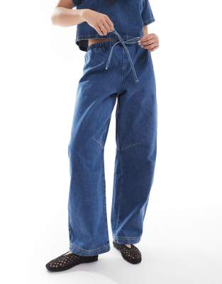 Shop Asos Design Lightweight Barrel Leg Denim Jeans-blue