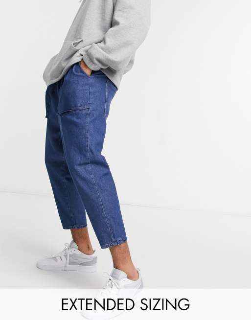 ASOS DESIGN lightweight drop crotch jeans in mid blue