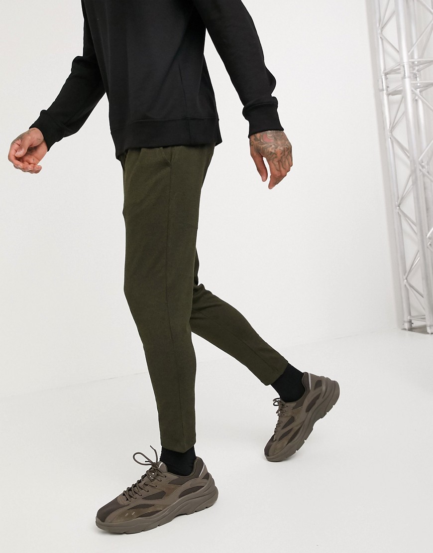 ASOS DESIGN lightweight skinny joggers in dark olive twisted yarn fabric-Green