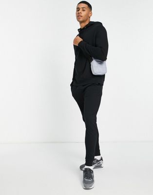 ASOS DESIGN lightweight tracksuit with hoodie and skinny joggers in black