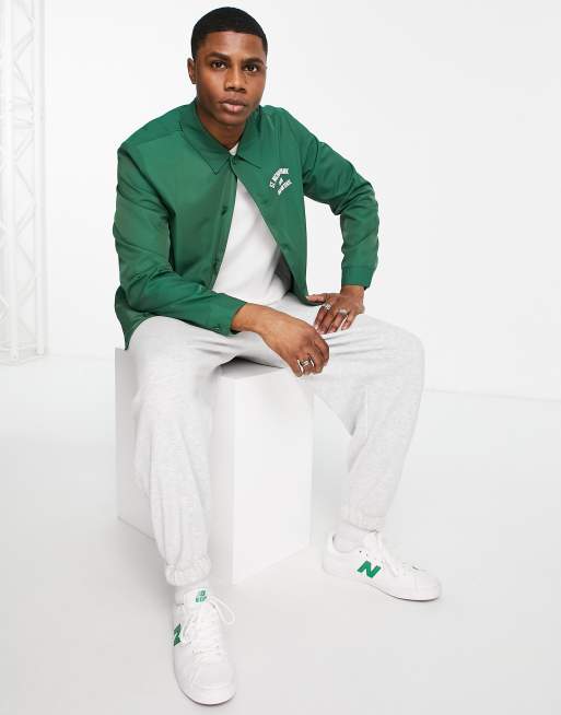 ASOS DESIGN lightweight varsity nylon coach jacket in green with back print  | ASOS