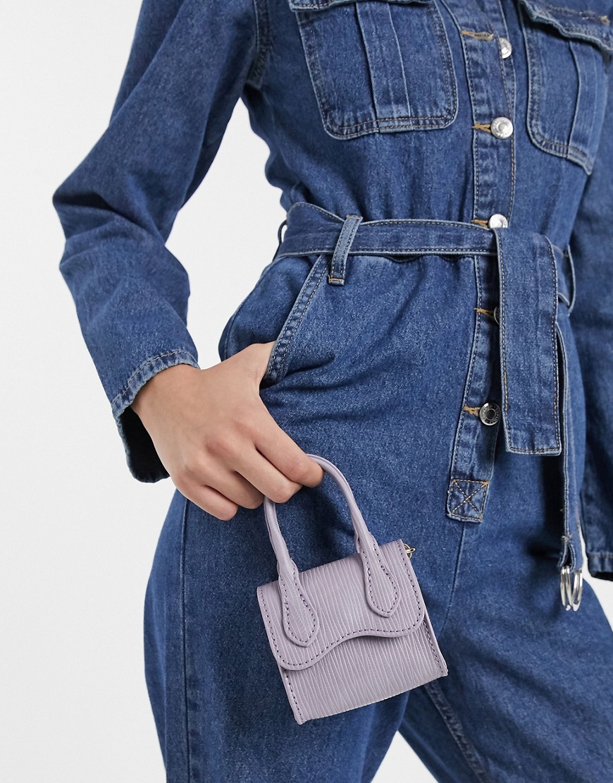 ASOS DESIGN – Lila, ödelmönstrad handväska med rundat viklock, bärhandtag och löstagbar axelrem