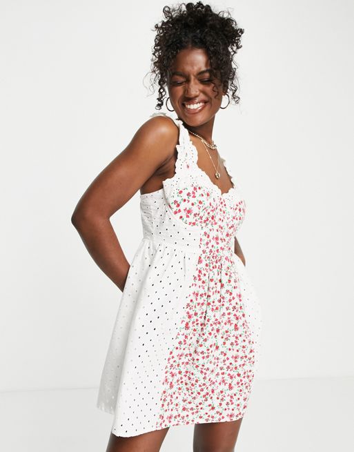 ASOS DESIGN – Liliowa sukienka letnia mini w kwiaty z haftem angielskim i  zdobieniem na miseczkach | ASOS