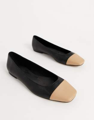 black and tan flats