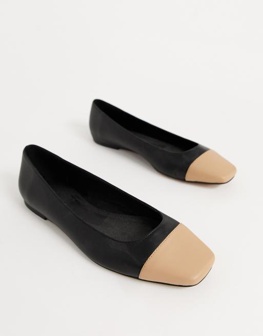 ASOS DESIGN Limbo toe cap ballet flats in black and tan