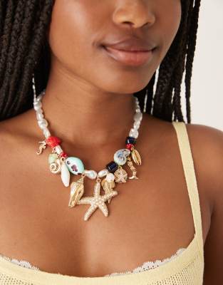 ASOS DESIGN Limited Edition faux pearl necklace with large sea-life charms - view 1