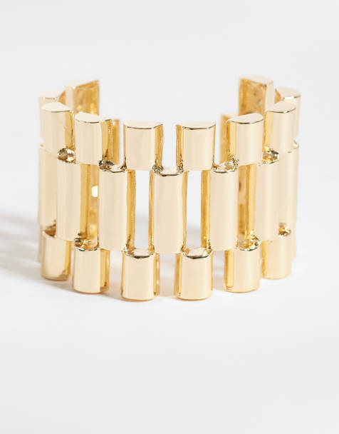 ASOS DESIGN Limited Edition large cuff bangle with watch-strap design in gold tone - view 1