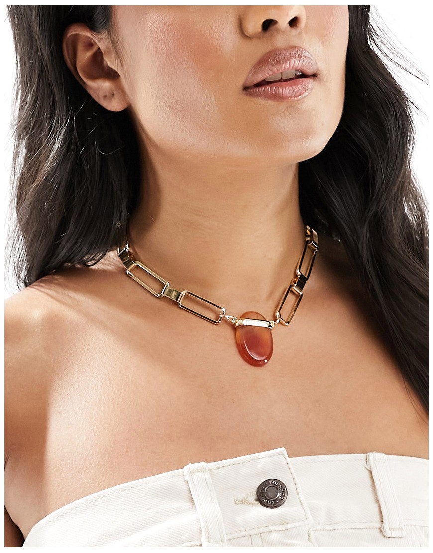 ASOS DESIGN Limited Edition necklace with red agate semi precious stone and tbar design in gold tone