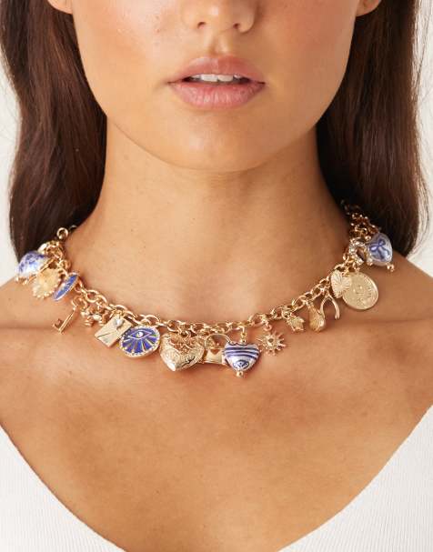 ASOS DESIGN Limited Edition short charm necklace in gold tone with mixed large charms - view 1