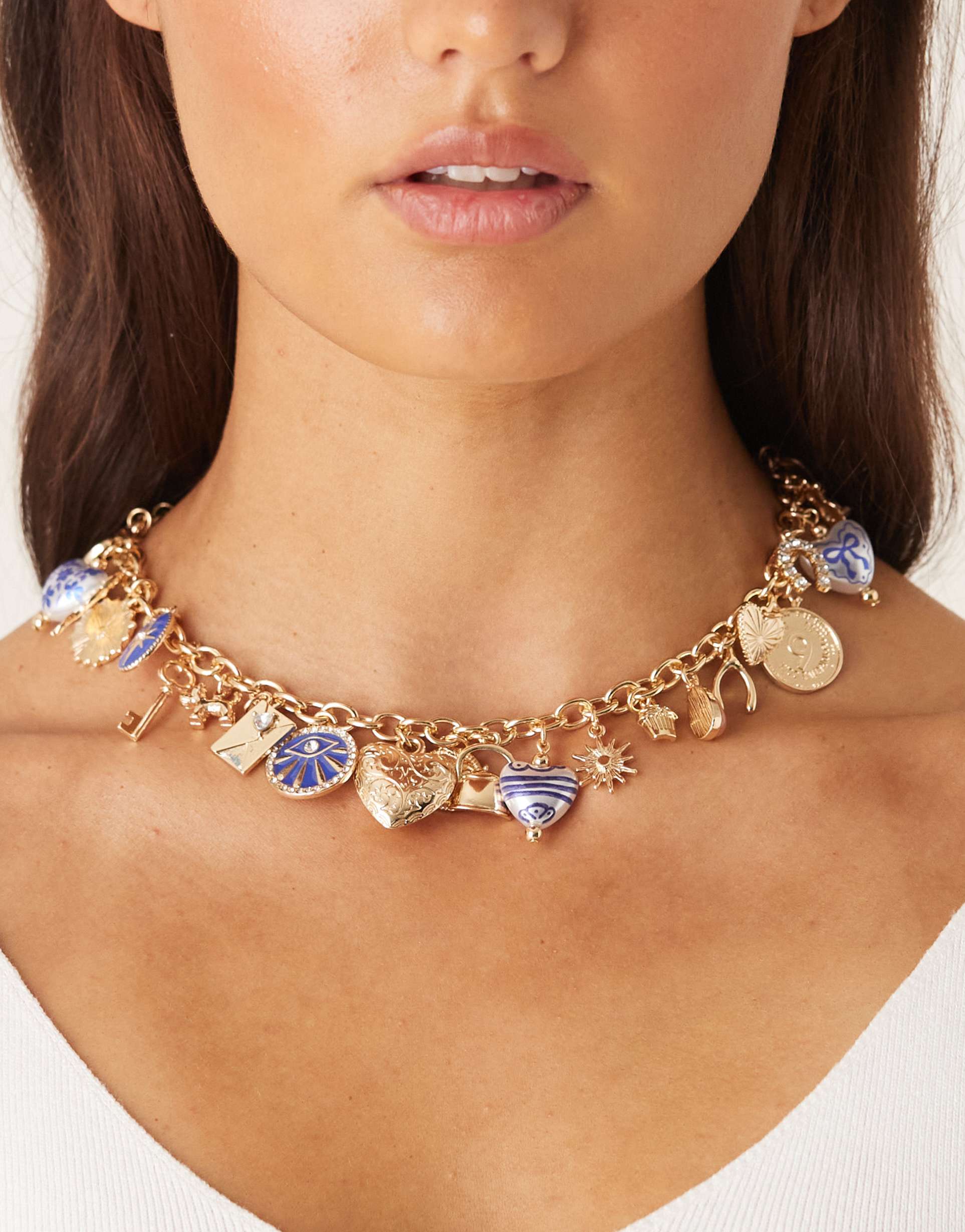 asos design limited edition short charm necklace in gold tone with mixed large charms