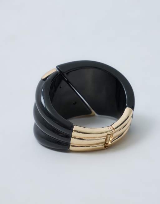 ASOS DESIGN Limited Edition XL abstract clasp bangle in black resin with gold detailing, 4 of 4