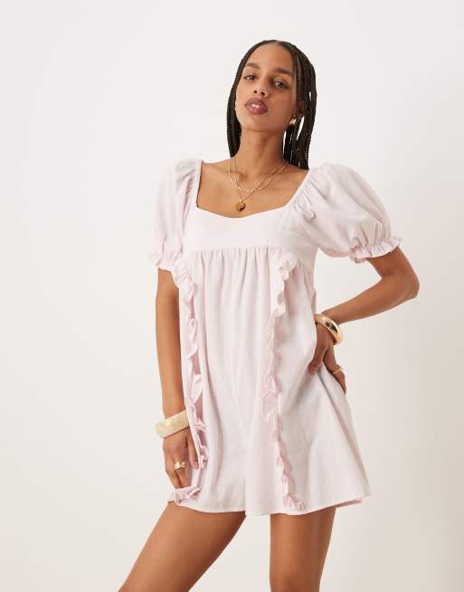 ASOS DESIGN linen babydoll puff sleeve playsuit with bow back detail in powder pink, 3 of 4