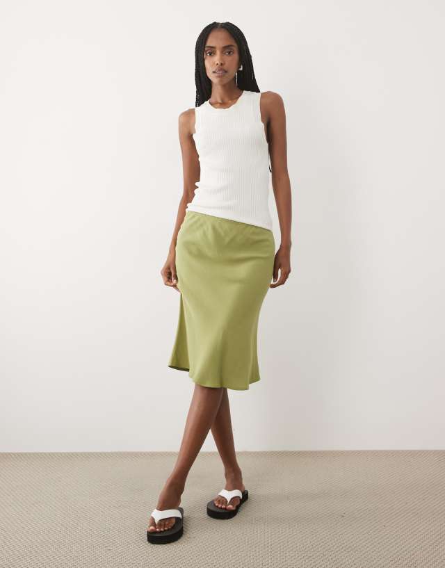 ASOS DESIGN linen blend 90s satin bias cut skirt in olive green | ASOS