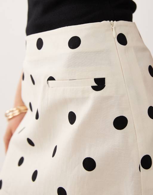 ASOS DESIGN linen blend mini skirt in white polka dot print, 4 of 5
