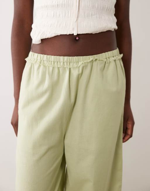ASOS DESIGN linen blend pull on barrel leg pants with raw seam detailing in sage, 3 of 5
