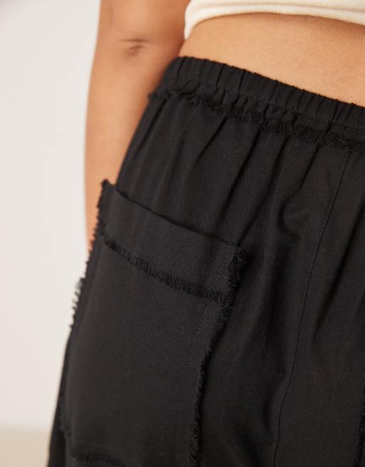 ASOS DESIGN linen blend pull on barrel leg pants with raw seam details in black