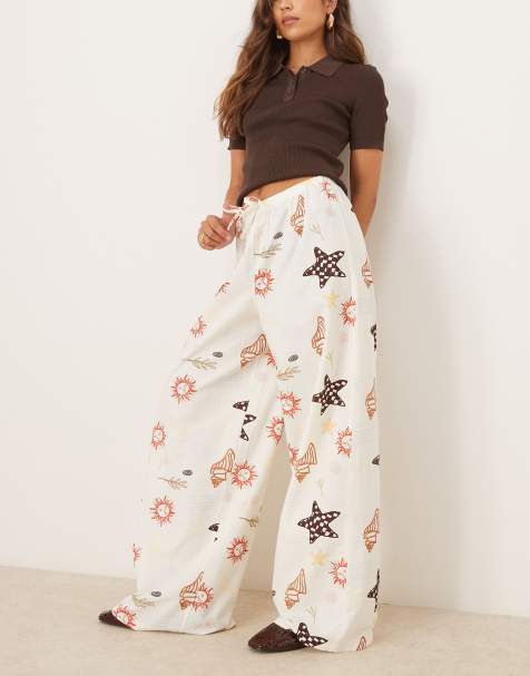 ASOS DESIGN linen blend pull on trouser in holiday print - view 1