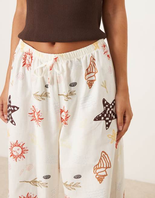 ASOS DESIGN linen blend pull on trouser in holiday print, 4 of 5