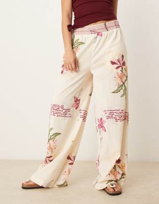 ASOS DESIGN linen blend pull on wide leg pants with shirred waist detail in floral print