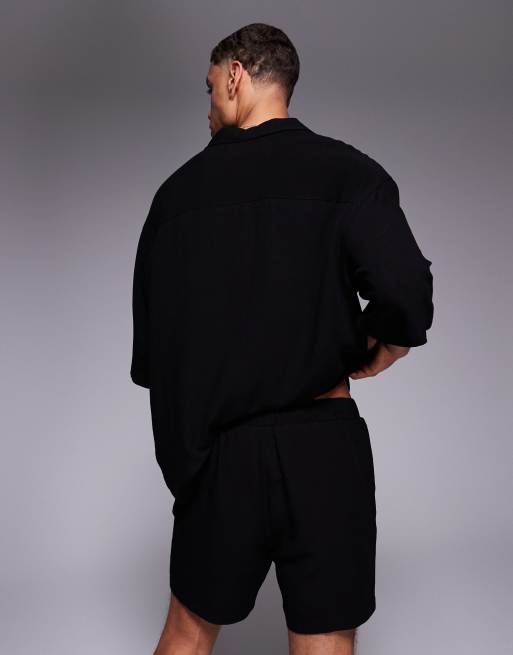 ASOS DESIGN linen blend shorts in mid length in black
