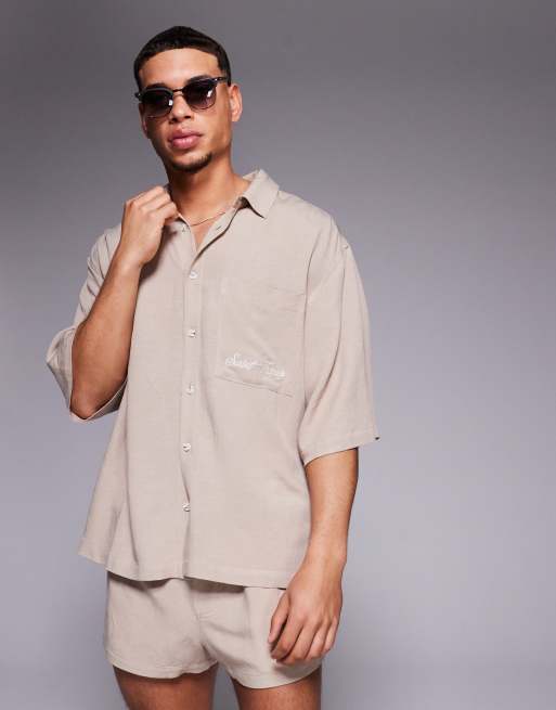 ASOS DESIGN linen blend shorts in super short length in tan