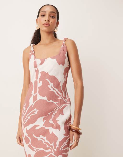 ASOS DESIGN linen blend twisted straps bias cut midi dress in blown out palm print