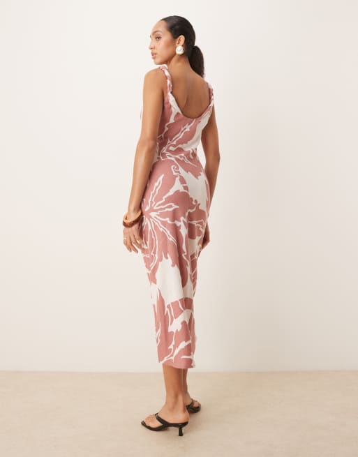ASOS DESIGN linen blend twisted straps bias cut midi dress in blown out palm print