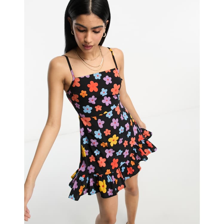 ASOS DESIGN linen cami mini sundress with ruffle hem in bold daisy print