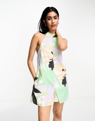 ASOS DESIGN linen look halter a line playsuit in abstract tropical print