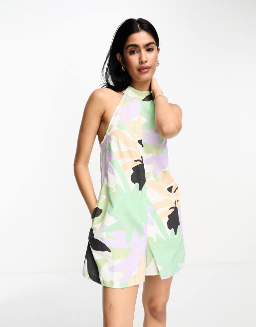 ASOS DESIGN linen look halter a line playsuit in abstract tropical print ASOS