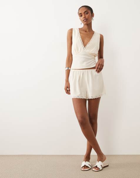 ASOS DESIGN linen look pull on shorts with lace trim in ivory - view 1