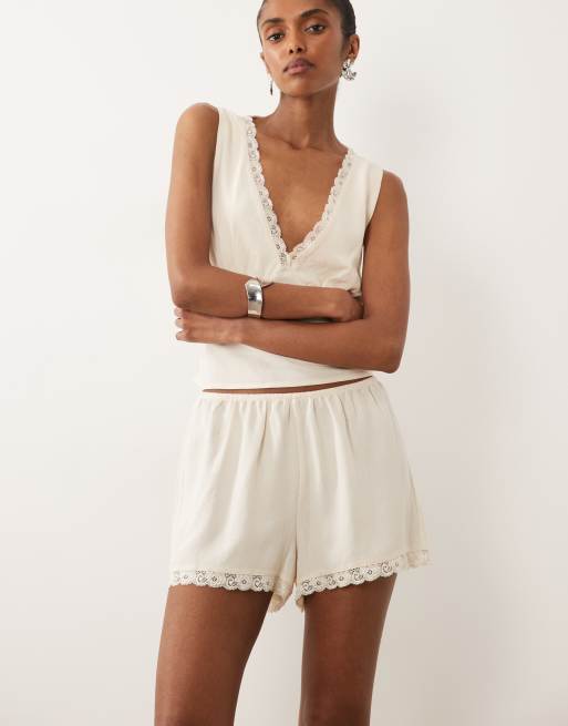 ASOS DESIGN linen look pull on shorts with lace trim in ivory , 2 of 5