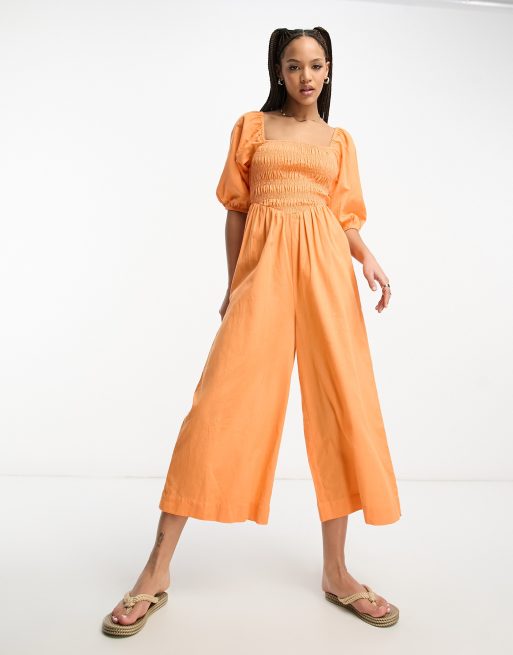 ASOS DESIGN eyelet button through strappy romper in orange