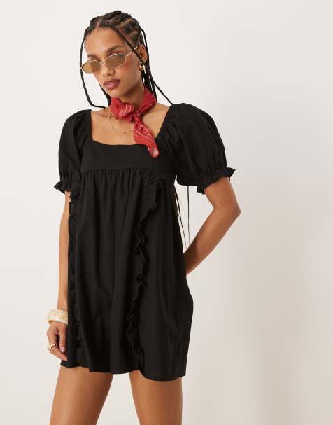 ASOS DESIGN linen mix babydoll puff sleeve romper with bow back detail in black - view 1