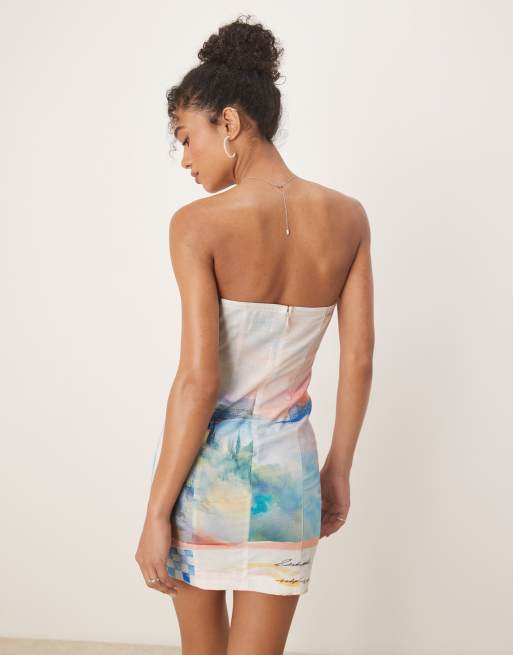ASOS DESIGN linen mix bandeau mini dress in washed postcard print - part of a set