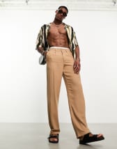 ASOS DESIGN baggy chinos in stone paper touch | ASOS