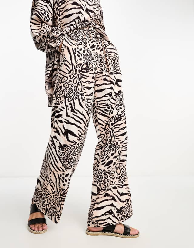 ASOS DESIGN linen pull on pants set in animal print