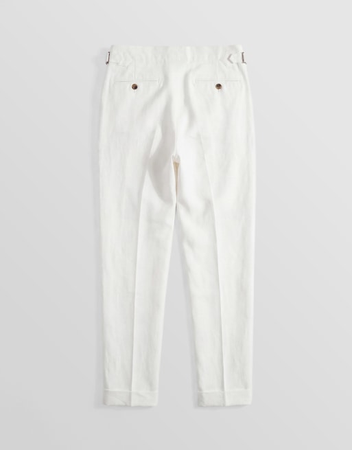 ASOS DESIGN linen rich tailored tapered fit trousers in white with side adjuster detail , 7 of 9