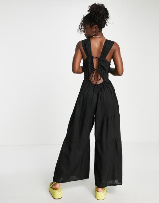 ASOS DESIGN linen button strap jumpsuit in black