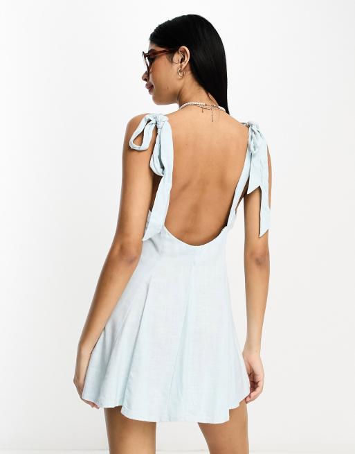 Ruffle trim outlet tie back dress